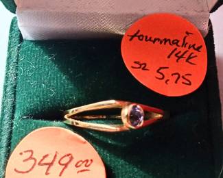 2.15g of 14k gold with tourmaline stone. Size 5.75. $349