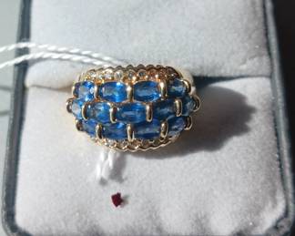 14k gold and deep blue topaz ring.