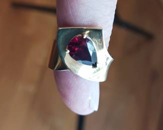 14k gold and garnet ring.