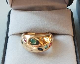 14k gold ring with gemstones.