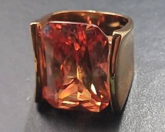 This tests as 14k gold but we are having trouble reading the stamp. Awesome gemstone!