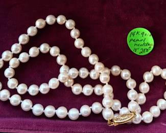 14k gold and genuine cultured pearl necklace.