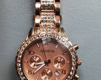 Geneva date and time watch.