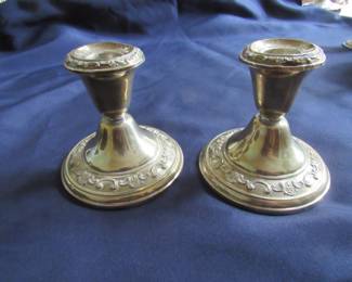 Sterling candlestick holders - Sterling items will not be discounted.