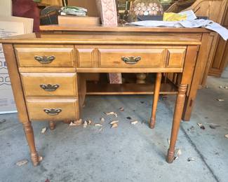 Table with built-in Singer sewing machine.
