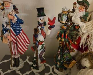 L-R Lenox Pencil Santa collectibles Star Spangled Santa, issued 2002, Winter Friend, issued 1999, Tannenbaum Santa, issued 2004