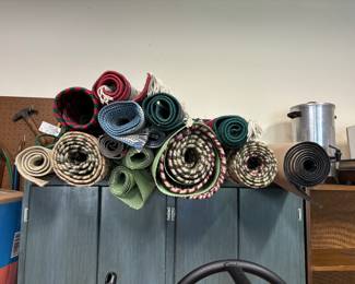 Multiple braided rugs