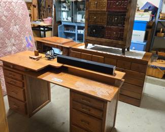 Oak sewing desk, TV sound bar, small chest with license plate drawers, full maple dresser, Singer treadle sewing machine 