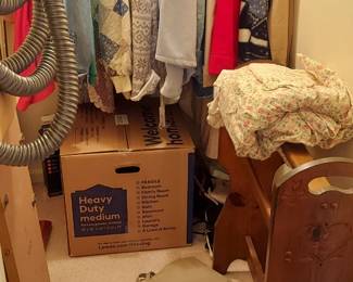 Outerwear, quilt rack, King bedskirt. Note - new individual photos will be posted after condo painting is complete and sale items can be arranged/displayed.