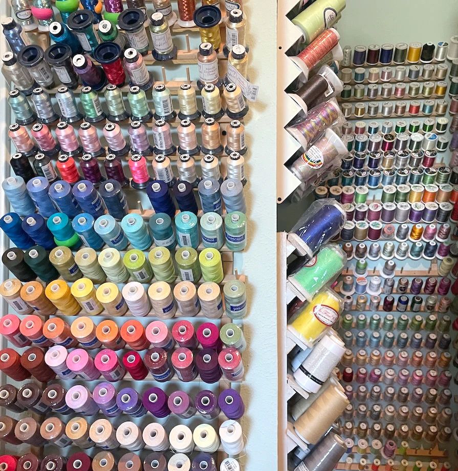 Spools/cones of thread, many unopened.