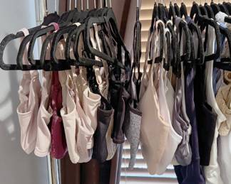 Women’s tops mostly size Large; winter vests, jackets, blouses, shirts, never worn undergarments; pants mostly size Small including multiple pairs of jeans from White House Black Market; shoes in sizes 7 - 8.5, many barely worn. Brands include Suzanne Betro, Lularoe, Ewedoos