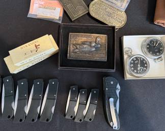 Pocket + buck knives; brass belt buckles, pocket waches