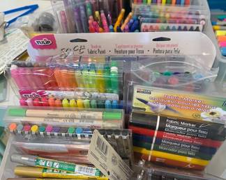 Assorted markers + office supplies