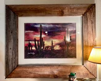 Large wood frame with beautiful desert sunset  