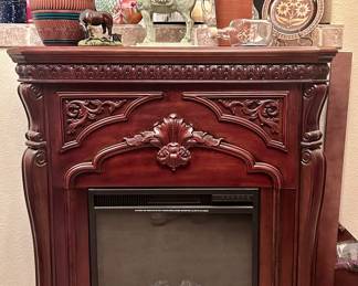 Wood remote controlled fireplace in perfect condition (included with extra wood attachments to make a corner fireplace)