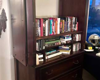 Wood armoire with opening cabinets and shelving 