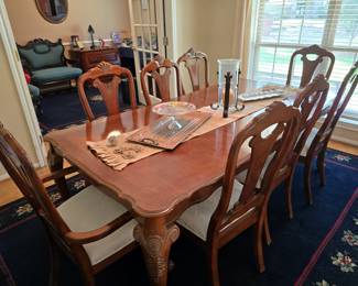 Dining Table with 8 Chairs and has an 18" Leaf That Can be Taken Out