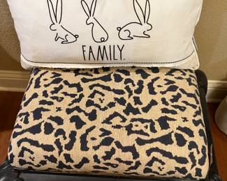 Large black metal stool with animal print upholstery