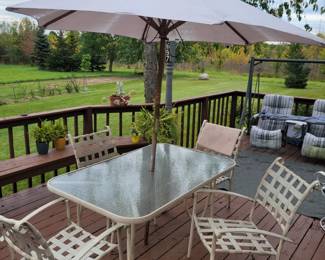 Glass Top Patio Set However Umbrella In Poor Condition But Chairs And Table In Good Condition