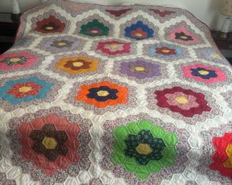Several vintage quilts 