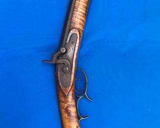 Mid 19th Century half stock percussion muzzle loading long rifle signed Samuel Ginger purchased in Kentucky.
