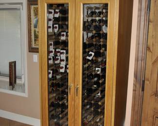 Approximate 400 bottle wine frig along with 200+ bottles of vino. A list of the better bottles will be listed in the description when available.