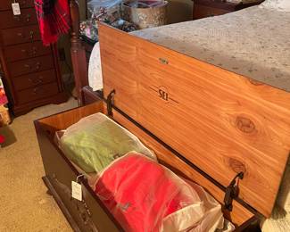 Cedar chest full of vintage sweaters