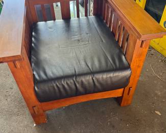Great chair Stickily style . This item is in the garage. Lots of things in the garage. A store was closed and everything was moved to the garage before he passed away.