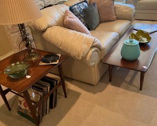 Soft beige leather love seat, mid-century coffee table matches the two end tables