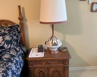 two night stands with two mid-century lamps