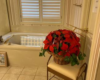 Make-up chair and large Christmas arrangement 