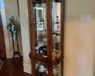 Thomasville lighted curio cabinet and decor
