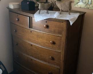 Antique dresser, lamp, wall hangings