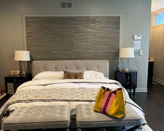 Custom upholstered king size bed and mattress.  Two custom upholstered ottomans.