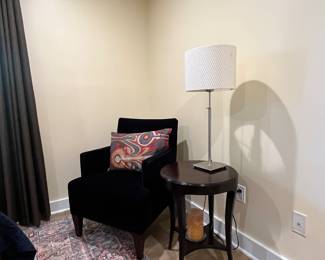 Velvet armchair, side table and lamp