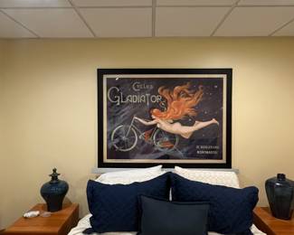 Queen size bed, mattress, two night stands, and poster art.