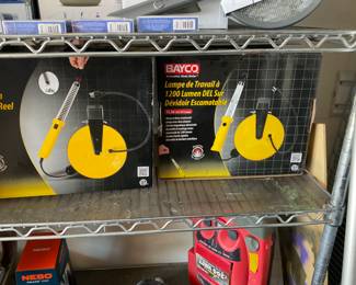Bayco 60 LED work light on metal real with 50 foot cord