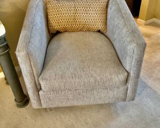 A Pair of Barrel Swivel Chairs
