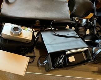 cameras: SLRs, point and shoot, antique cameras, Cam corders, vintage film cameras and video tape player