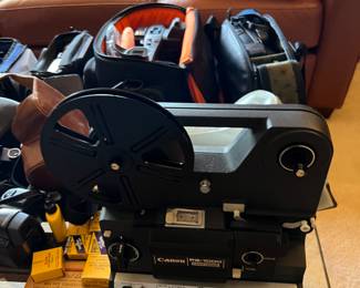 cameras: SLRs, point and shoot, antique cameras, Cam corders, vintage film cameras and video tape player