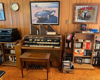 DVDs, VHS cassettes, automotive wall art, Hammond organ