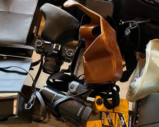 cameras: SLRs, point and shoot, antique cameras, Cam corders, vintage film cameras and video tape player