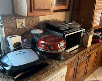 Lots of kitchenware for baking, cooking, etc