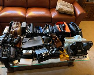 cameras: SLRs, point and shoot, antique cameras, Cam corders, vintage film cameras and video tape player
