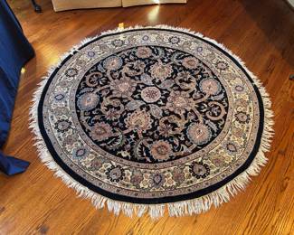 Persian, round, hand-knotted rug