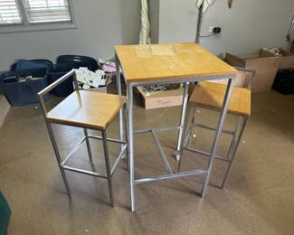 High-top industrial table with 2 stools
