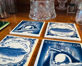 Vintage cut crystal wine bottle coaster / Price: $38 --- Holland America Delft Blue coaster tile set of 4 / Price: $12