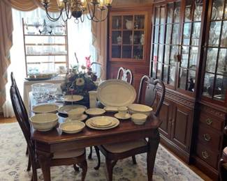 Pennsylvania House dining room set- table with two leaves, six chairs, china cabinet.  Also pictured 8' by 10' wool rug