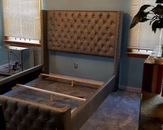 Queen bed frame with padded headboard and footboard