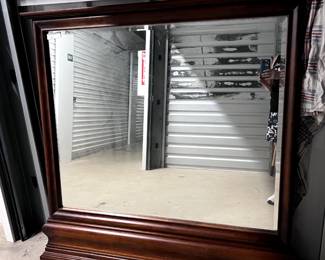 Mirror to cherry finish dresser